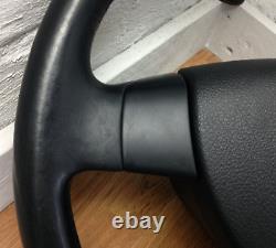 Genuine VW black leather GT steering wheel, with centre. Fits T5, 2003-2009. C2